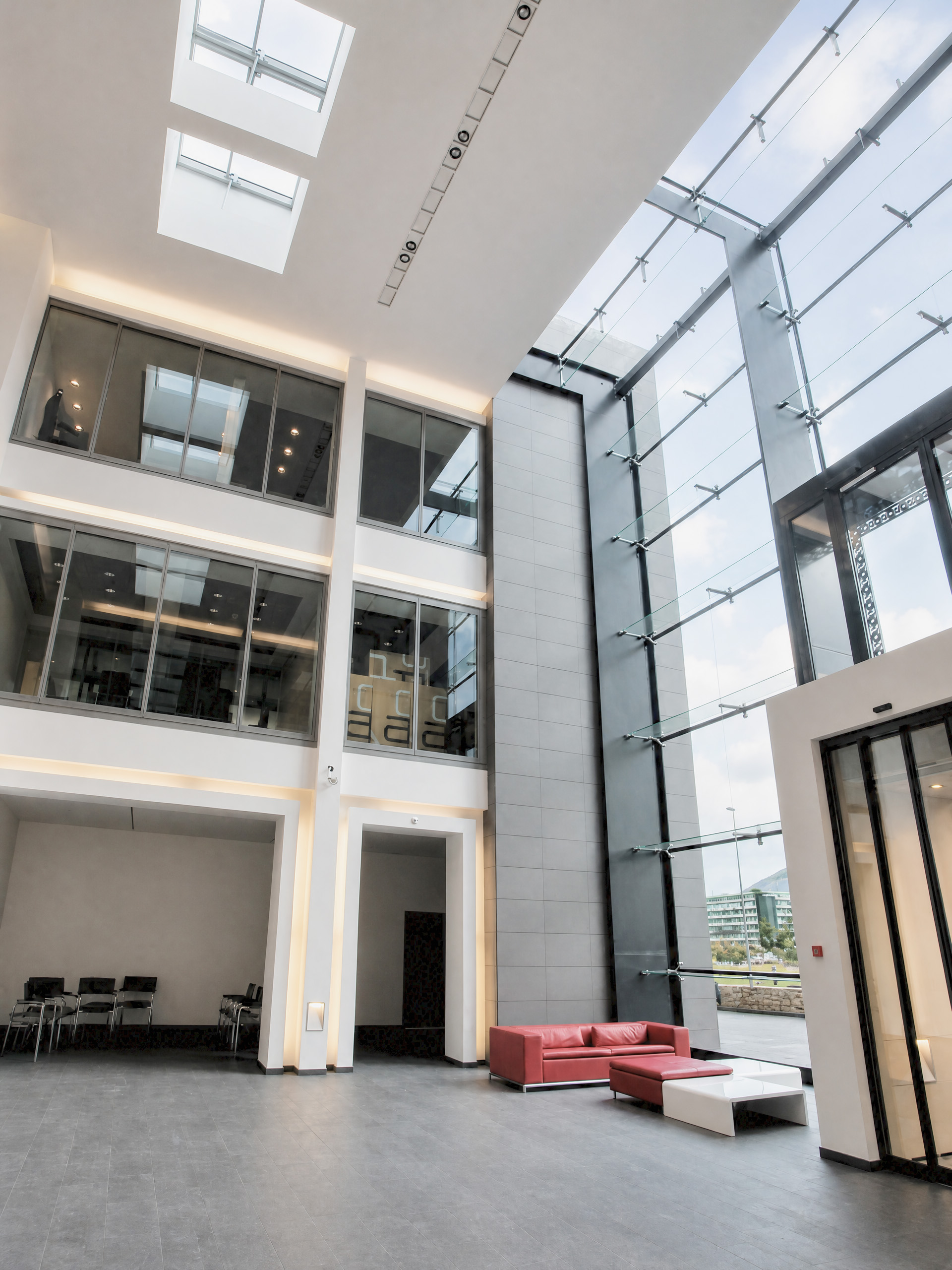 Manufacture horlogère — atrium et espaces de distribution